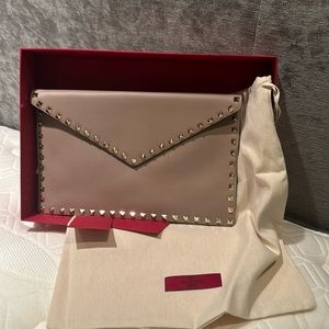 Brand new clutch with dust bag and box